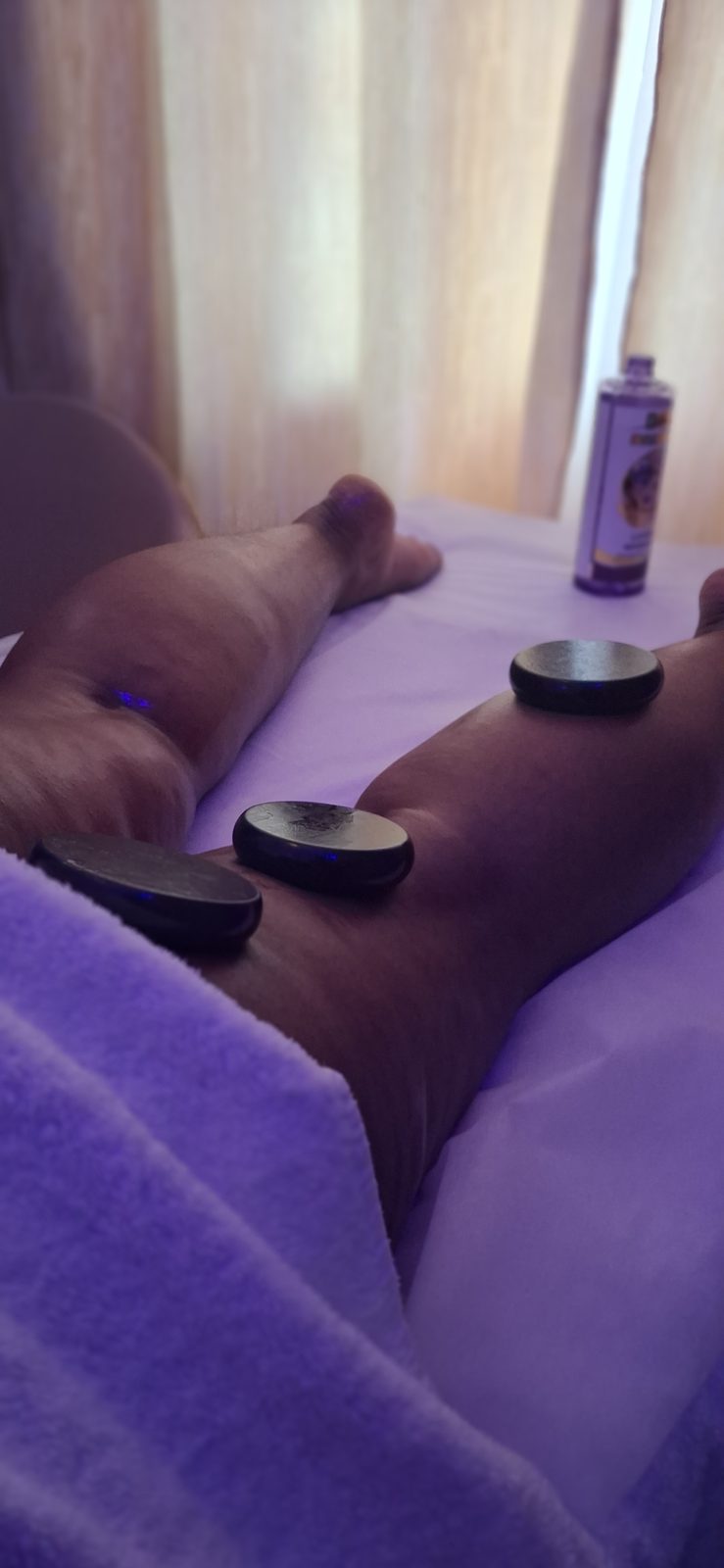 Hot stone therapy in progress