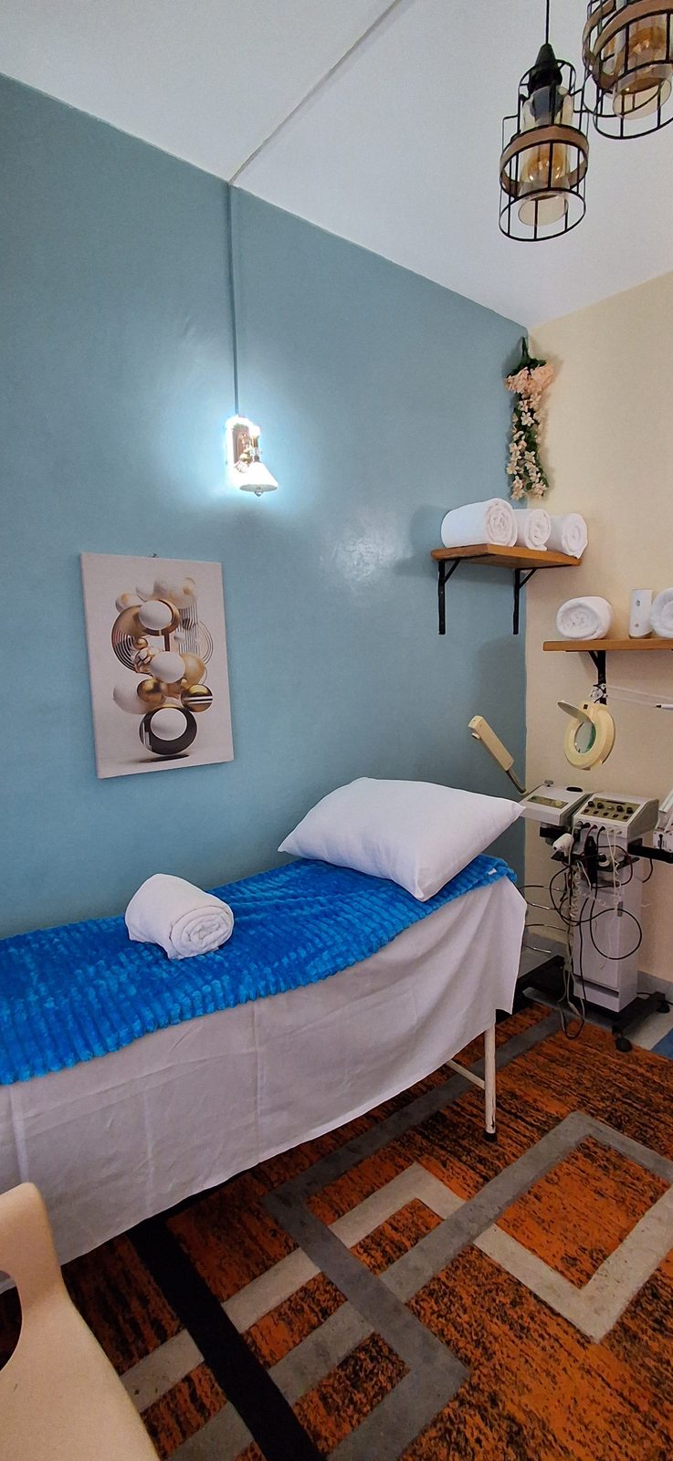 A treatment room at Clips Serenity Spa, made up and ready